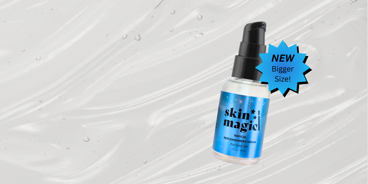 Skincare bottle labeled 'skin magic' with a 'NEW Bigger Size!' label on a textured gray background